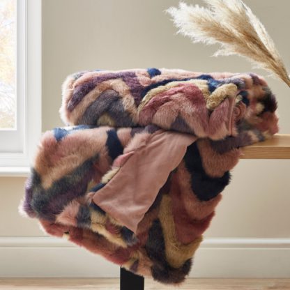 An Image of Eska Faux Fur Throw Green, Brown and Yellow