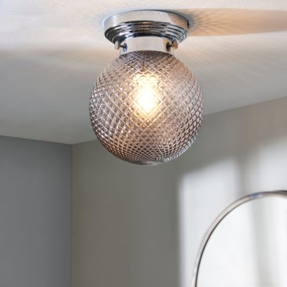 An Image of Tropic Bathoom Faceted Sphere 1 Light Flush Ceiling Fitting Clear