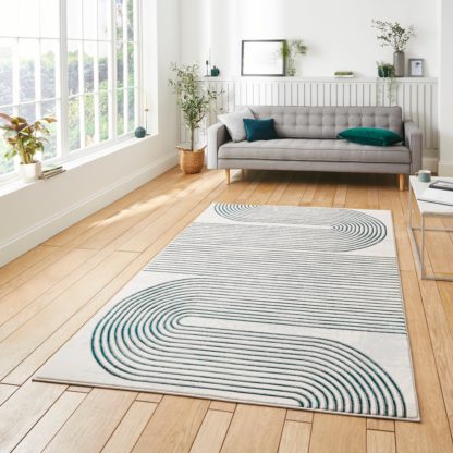 An Image of Apollo Swirl Washable Rug Navy (Blue)