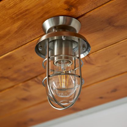 An Image of Barker Industrial Indoor Outdoor Flush Ceiling Light Black