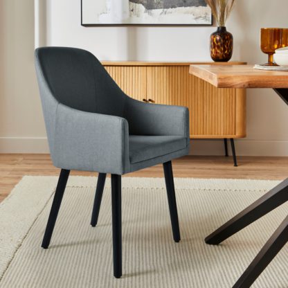 An Image of Eddie Luna Fabric Carver Dining Chair Olive