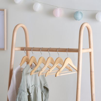 An Image of Pack of 6 Kid's Wooden Hangers Navy Blue