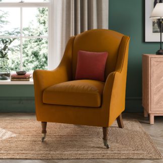 An Image of Harriet Wing Velvet Armchair, Amber Gold Amber Gold