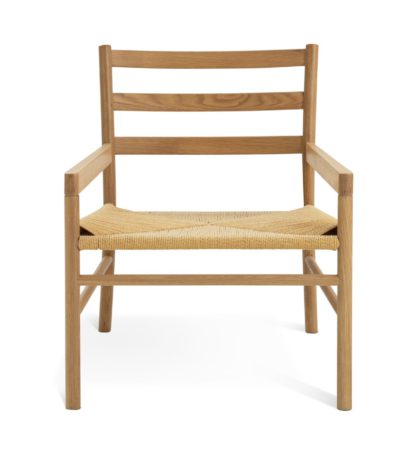 An Image of Habitat Laurie Solid Oak Lounge Chair - Natural