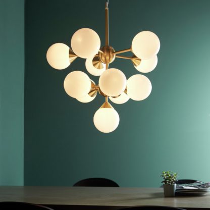 An Image of Shore Light Genoa Metal 11 Light Pendant Light - Brass