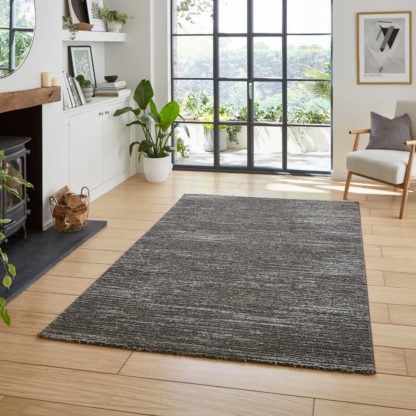 An Image of Flores Ribbed Washable Rug Charcoal