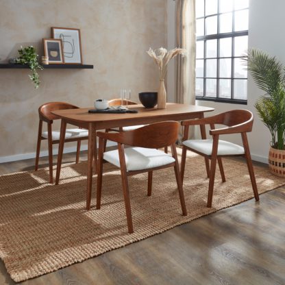 An Image of Karla Rectangular Extendable Dining Table with Oskar Black Stained Ivory Boucle Dining Chairs