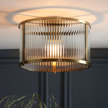 An Image of Vogue Hadley Ribbed Flush Ceiling Light Gold