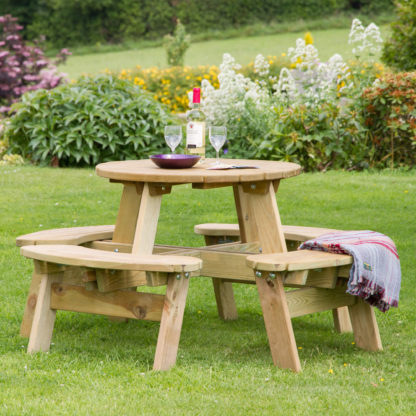 An Image of Katie Round Picnic Table Natural