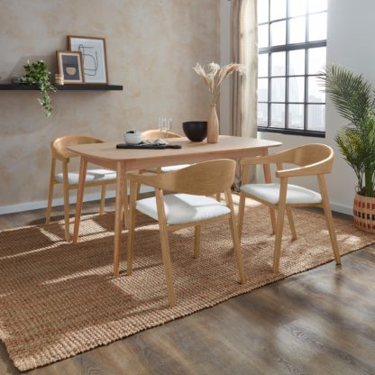 An Image of Karla Rectangular Extendable Dining Table with Oskar Black Stained Ivory Boucle Dining Chairs