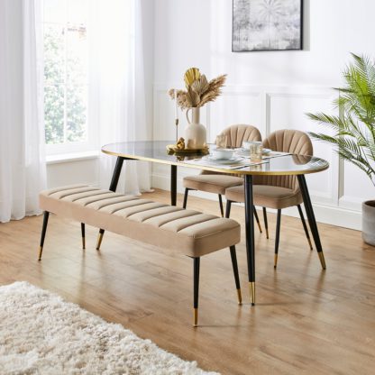 An Image of Sylvia Oval Dining Table with Sylvia Black Velvet Dining Bench & Chairs