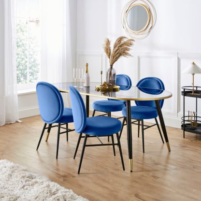 An Image of Sylvia Oval Dining Table with Renata Mole Velvet Dining Chairs