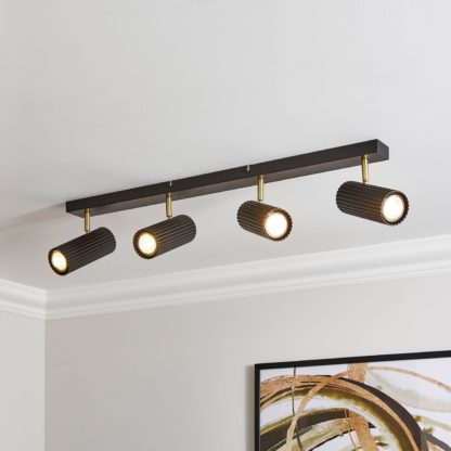 An Image of Georgi Industrial Ribbed 4 Light Adjustable Semi Flush Spotlight Bar Black