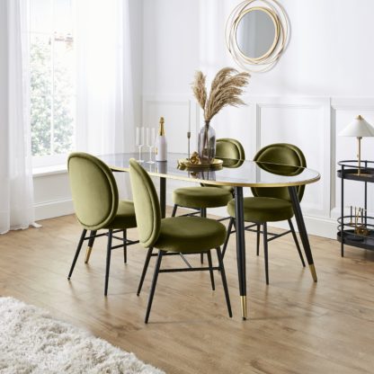 An Image of Sylvia Oval Dining Table with Renata Mole Velvet Dining Chairs