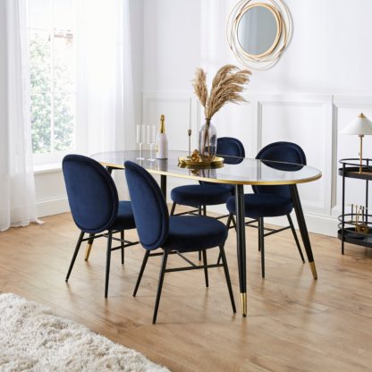 An Image of Sylvia Oval Dining Table with Renata Mole Velvet Dining Chairs