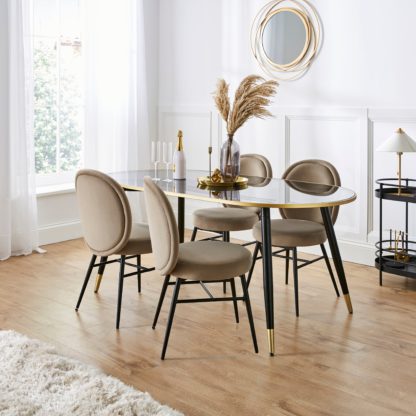 An Image of Sylvia Oval Dining Table with Renata Mole Velvet Dining Chairs