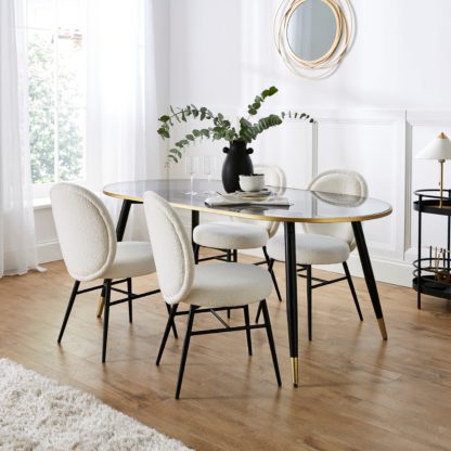 An Image of Sylvia Oval Dining Table with Renata Mole Velvet Dining Chairs