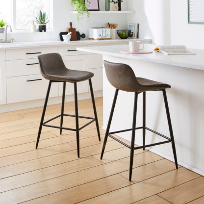 An Image of Jayden Counter Height Bar Stool Tan