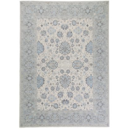 An Image of Otisse Traditional Rug Soft Blue