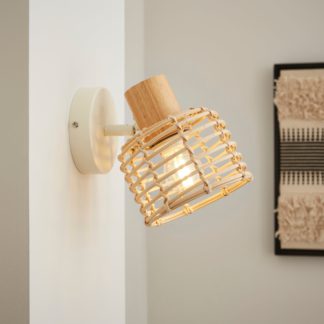 An Image of Emil Rattan Adjustable Wall Light Natural