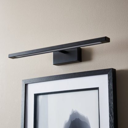 An Image of Zoie Modern LED Adjustable Picture Wall Light