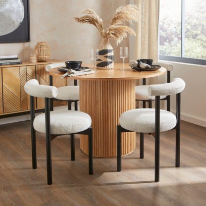 An Image of Amari Round Dining Table with 4 Violeta Ivory Boucle Dining Chairs