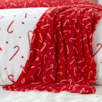 An Image of Catherine Lansfield Candy Cane Fleece Throw 130cm x 170cm Red