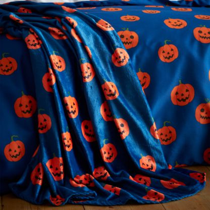 An Image of Catherine Lansfield Halloween Pumpkins Throw 130cm x 170cm Navy (Blue)