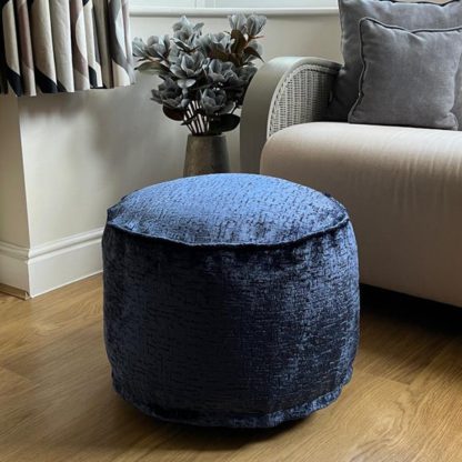 An Image of Daro Alex Round Pouffe