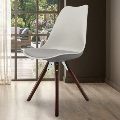 An Image of Fusion Living Soho White Plastic Dining Chair with Pyramid Legs